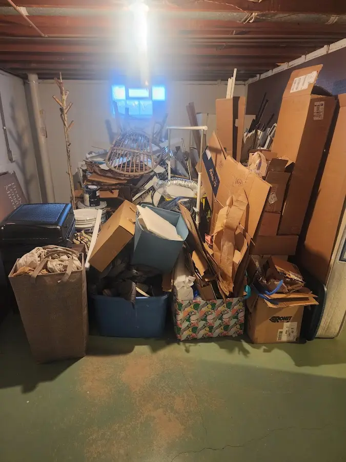 Roll-off dumpster container at job site for 8 Yard Dumpster Rental in Baxter